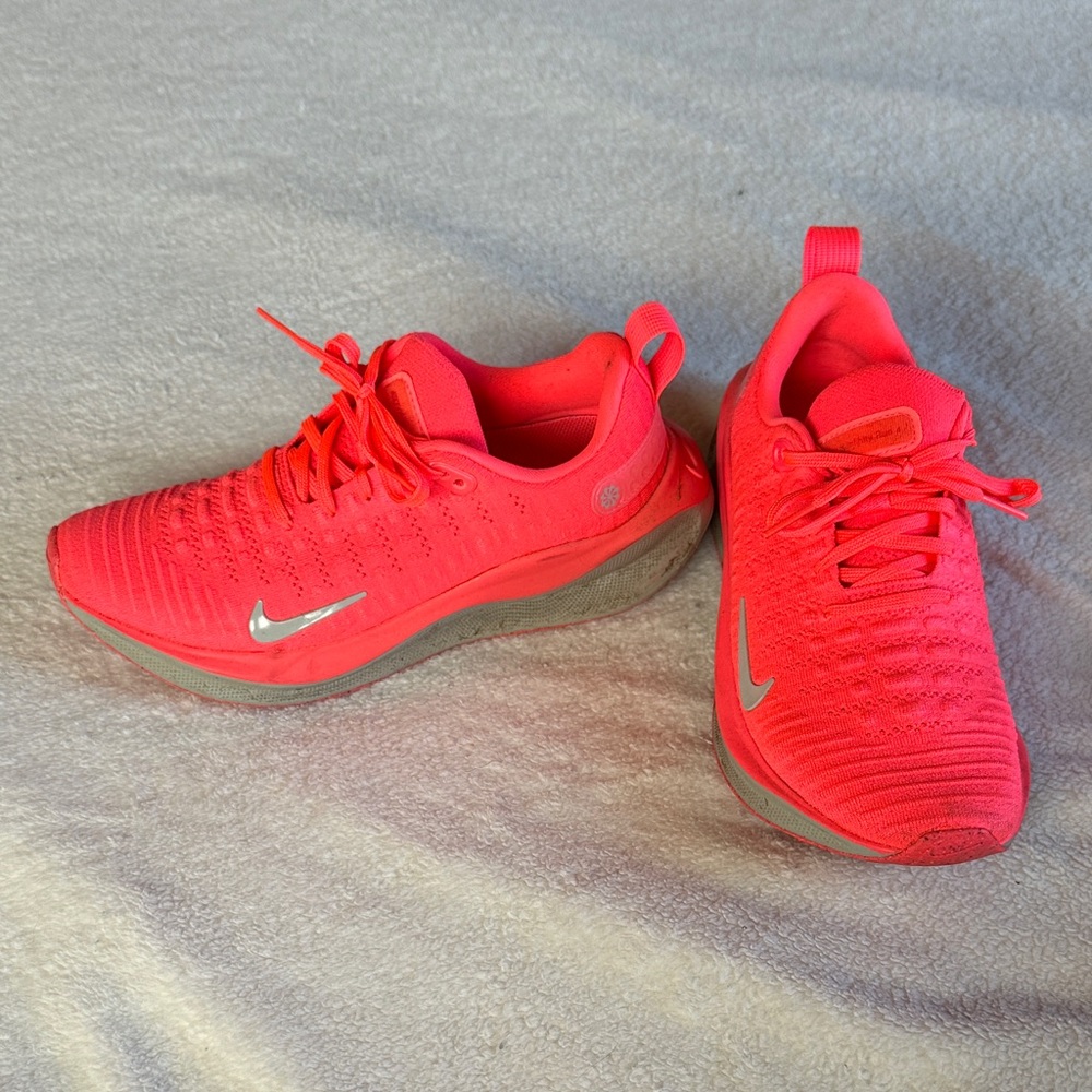 Nike Vibrant pink Athletic Shoes react x infinity run 4